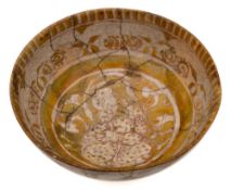 A Kashan lustre bowl: of rounded form with flared footrim,