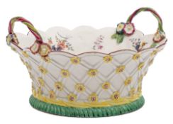 A fine Derby basket: with entwined twig handles,