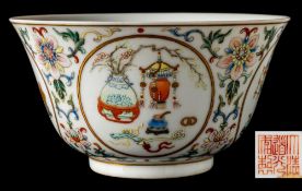 A Chinese famille rose medallion bowl: with flared rim and short cylindrical footrim,