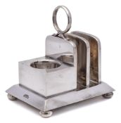 A silver plated combination toast rack and egg cup warmer, by Lockwood,