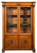 A French Charles X gilt metal mounted burr maple bookcase,