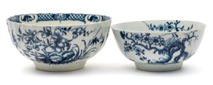 A First Period Worcester blue and white bowl and one similar: the first painted in the 'Prunus