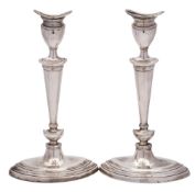 WITHDRAWN - A pair of Edward VII silver table candlesticks, maker Elkington & Co, London,
