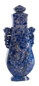 A Chinese lapis lazuli vase and cover: of flattened baluster form with lion dog and key pattern
