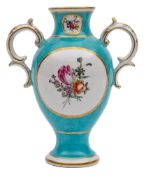A Chelsea-Derby turquoise ground baluster vase: with rococo scroll handles,
