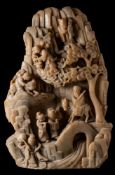 A large Chinese carved soapstone mountain: carved with scholars and other figures by a bridge and