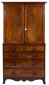 An early 19th Century mahogany and inlaid linen press:,