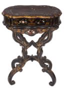 A Victorian papier mache and decorated work table:, of oval shaped outline,