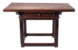An 18th Century French provincial walnut side table:, with a rectangular overhanging top,