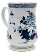 A large Liverpool [Richard Chaffers] blue and white bell-shaped mug: painted with pierced rockwork,