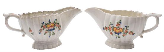 A pair of Plymouth sauceboats: each of gadroon-moulded form with double scroll handle and pedestal