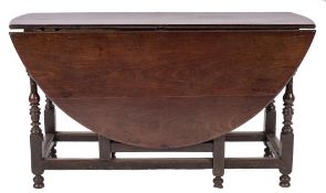 An early 18th Century walnut gateleg table:,