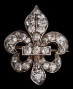 A late 19th century gold, silver and diamond mounted fleur-de-lis brooch: set with round old,