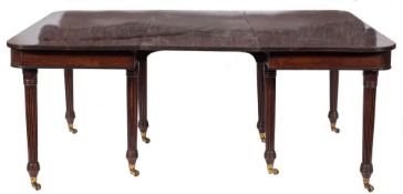 A Regency mahogany dining table in the manner of Gillows:,