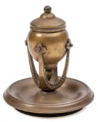 Tiffany and Co, a bronze inkwell: the well of ovoid form with hinged lid,