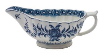 A Bow blue and white sauceboat: of fluted form with loop handle and thumb piece,