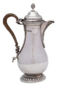 A Victorian silver hot water jug, maker Charles Stuart Harris, London,