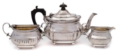 A late Victorian bachelor's silver matched three-piece tea service, maker Charles Stuart Harris,