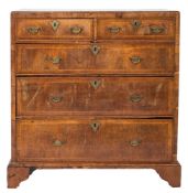 An early 18th Century walnut, crossbanded and feather strung rectangular chest:,