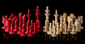A matched ivory Calvert pattern chess set:, natural and stained red, the king 10cm.
