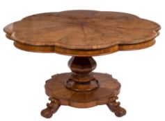 A Victorian rosewood breakfast table:, of flowerhead outline,
