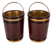 A pair of mahogany and brass bound buckets in the 18th Century style:,