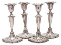 A set of four Victorian silver candlesticks, maker William Gibson & John Langman, London,