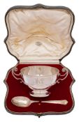 WITHDRAWN - An Edward VII matched silver christening twin handled bowl and spoon,