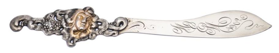 A sterling silver and gilt decorated Art Nouveau period paper knife,