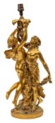 A 19th Century neo-classical ormolu figural table lamp: in the form of dancing bacchante entwined