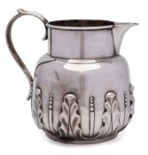 An Edward VII silver water jug, maker Goldsmiths and Silversmiths Co Ltd, London,