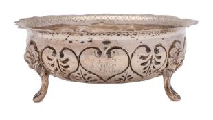 A Victorian silver sugar bowl, maker Henry Holland, London, 1869: of circular outline,