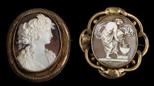 A large oval shell carved portrait cameo brooch within a gilt frame,