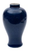 A small Chinese powder blue monochrome vase: of baluster form, 14.