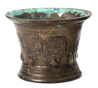 A 17th century Spanish bronze mortar: with flared rim,