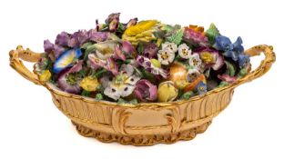 A Minton porcelain 'Trompe l'oeil' basket of flowers: the oval apricot ground basket with branch