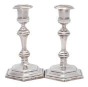 A matched pair of silver candlesticks, maker Thomas Bradbury & Sons Ltd, Sheffield, 1918 and London,