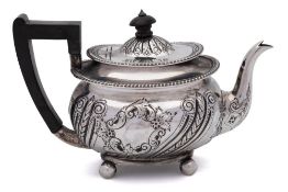 A Victorian silver teapot, maker Martin Hall & Co, Sheffield, 1897: of barge-shaped outline,