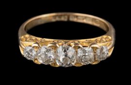 A late 19th century gold and diamond five-stone ring: with graduated cushion-shaped old