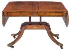 A Regency mahogany, rosewood banded and brass inlaid sofa table:, bordered with lines,