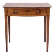 An early 19th Century mahogany bow-fronted side table:, the top with a reeded edge,