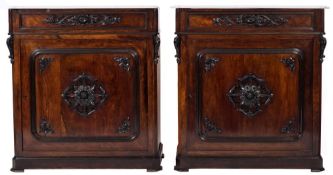 A pair of 19th Century French rosewood veneer pier cabinets:, each surmounted by a white marble top,