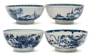 A group of four First Period Worcester blue and white bowls: painted or printed in the 'Fence',