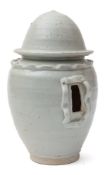 A Chinese Qingbai funerary vessel: in the form of a bulbous granary jar with domed top and covered