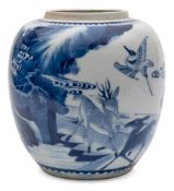 A Chinese porcelain oviform jar: painted in blue with a pair of deer and two cranes in a