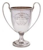 An Edward VII silver two handled trophy cup, maker Carrington & Co, London, 1905: inscribed,