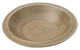 A Chinese Longquan twin-carp shallow dish: with flattened everted rim,