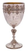 A Victorian silver trophy cup, maker William Edwards, London, 1871: inscribed,