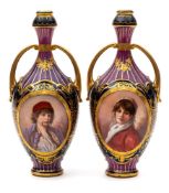 A pair of Austrian 'Vienna' porcelain two-handled vases: of ovoid form with waisted necks,