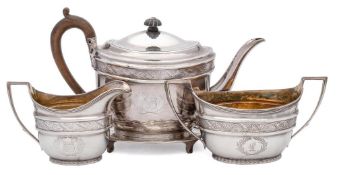 A George III three-piece tea service and a matching teapot stand, maker John Emes, London,